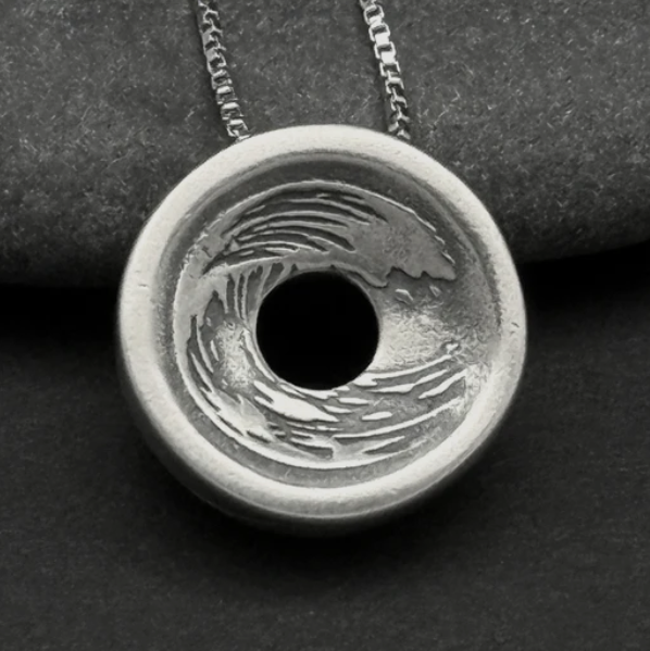 A silver pendant necklace