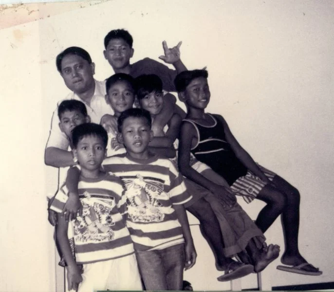 1993 - Fr Rocky and Kids.jpg