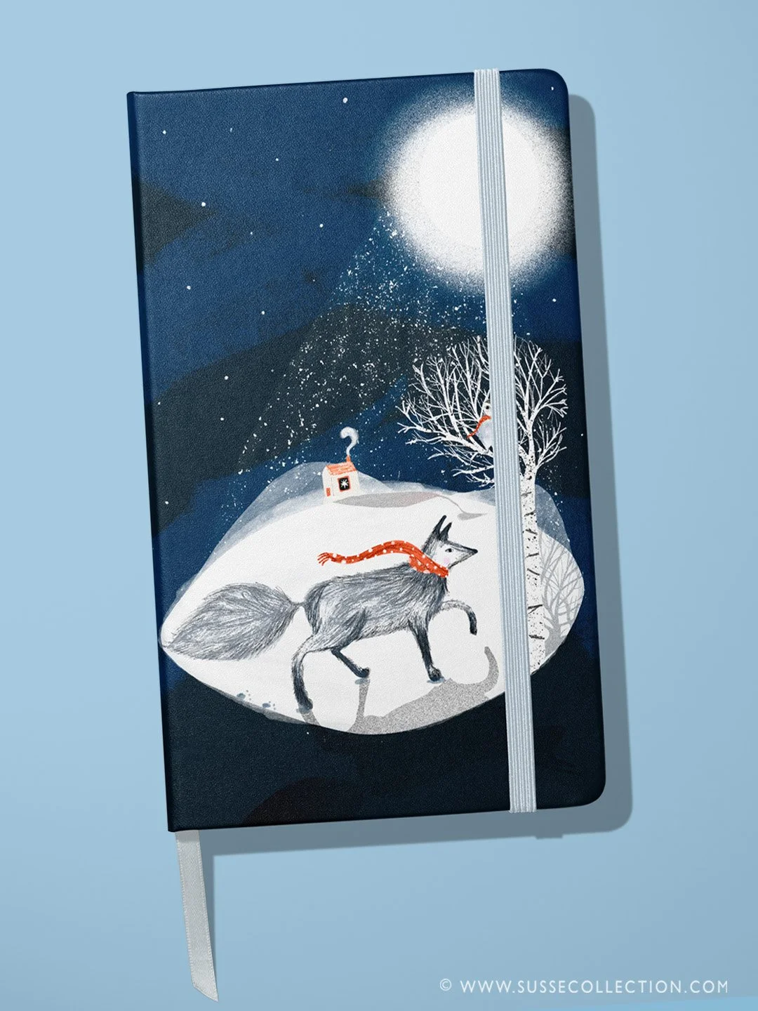 A photograph of an illustration of a wolf and winter scene