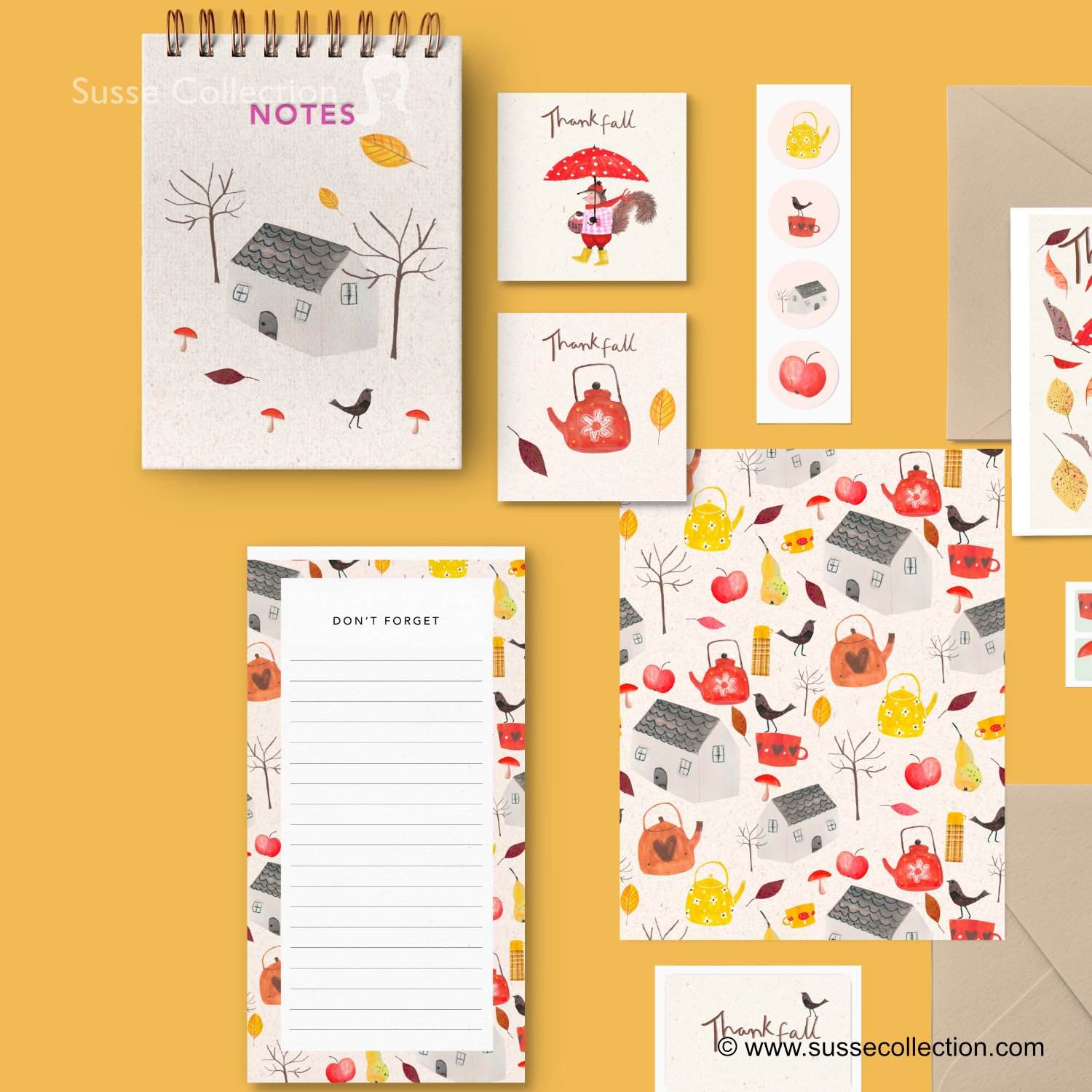 Collection of fall-themed stationery including a notepad, greeting cards, and patterned paper with illustrations of houses, bare trees, apples, teapots, kettles, cups, and birds in warm autumn colors.