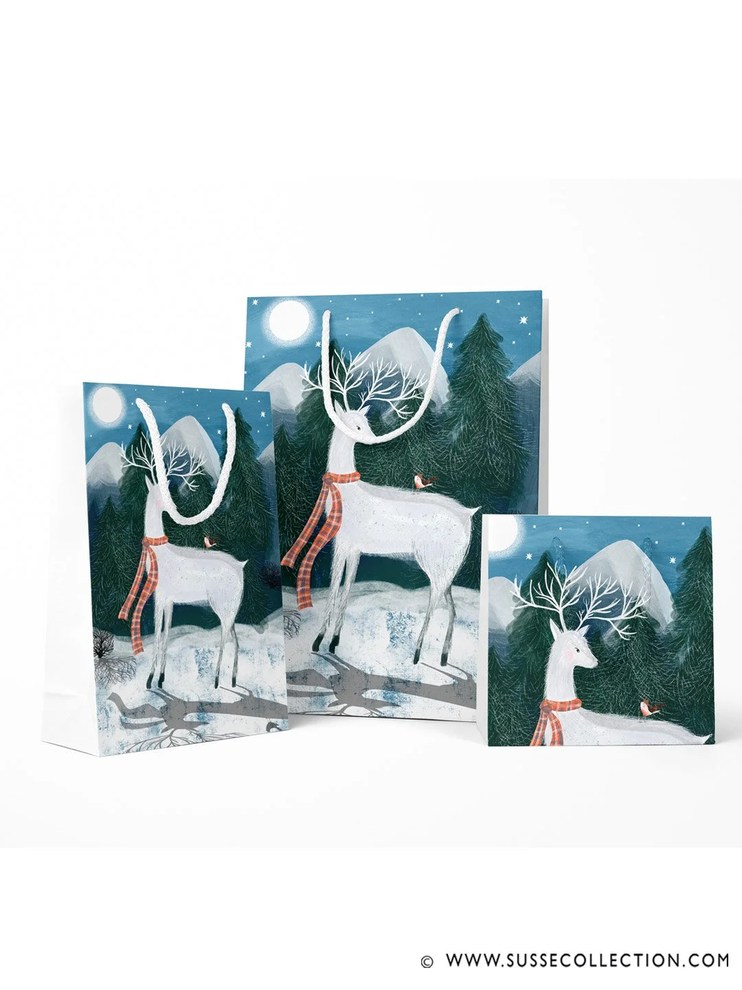 A photograph of an illustration of winter scene of a Scottish white stag and Robbin  on gift bags
