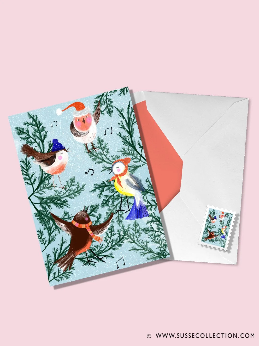 An illustration of Christmas Birds singing carols in a tree. on a Christmas greeting card