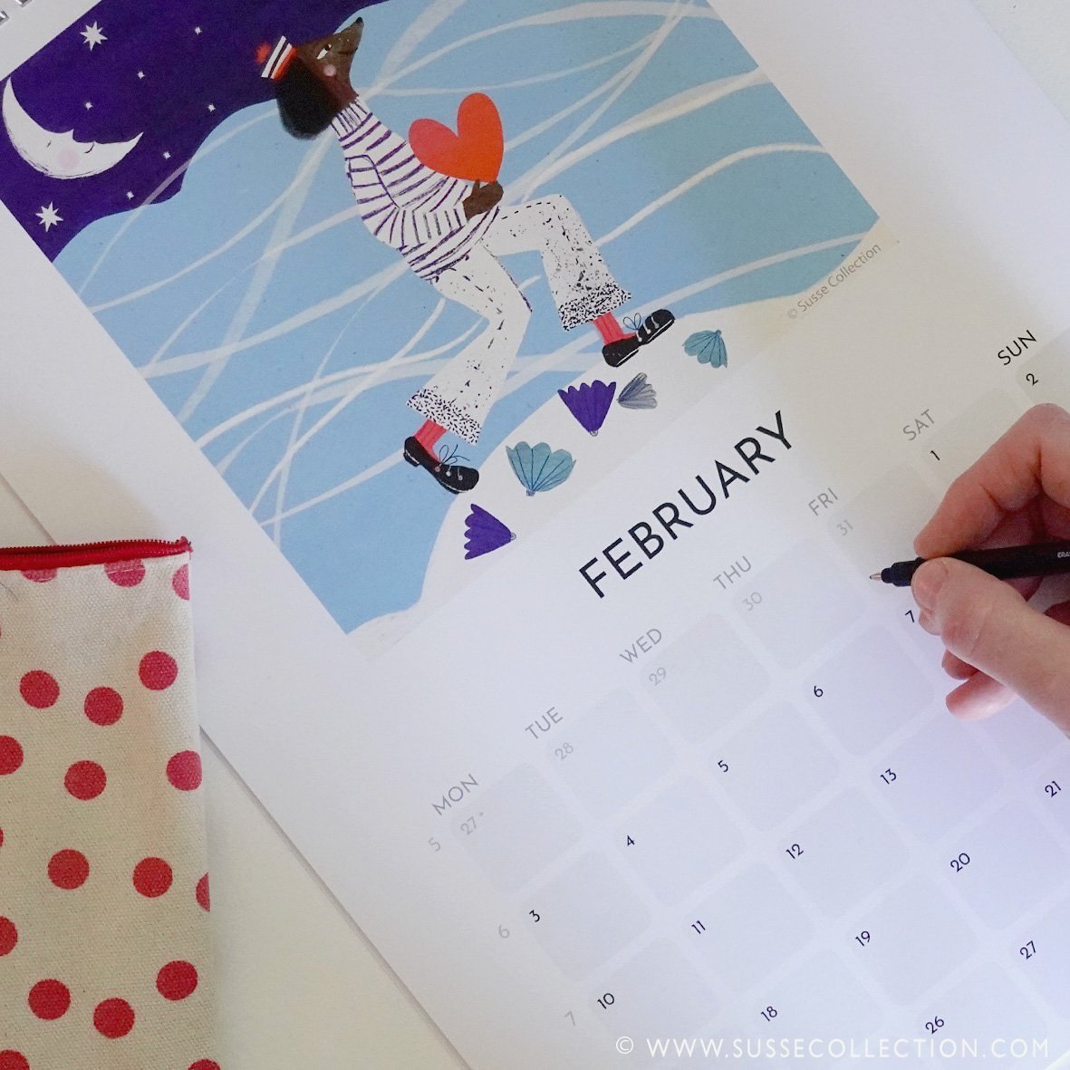 A photograph of the Susse Collection A3 Wall calendar illustrated By Susse Linton
