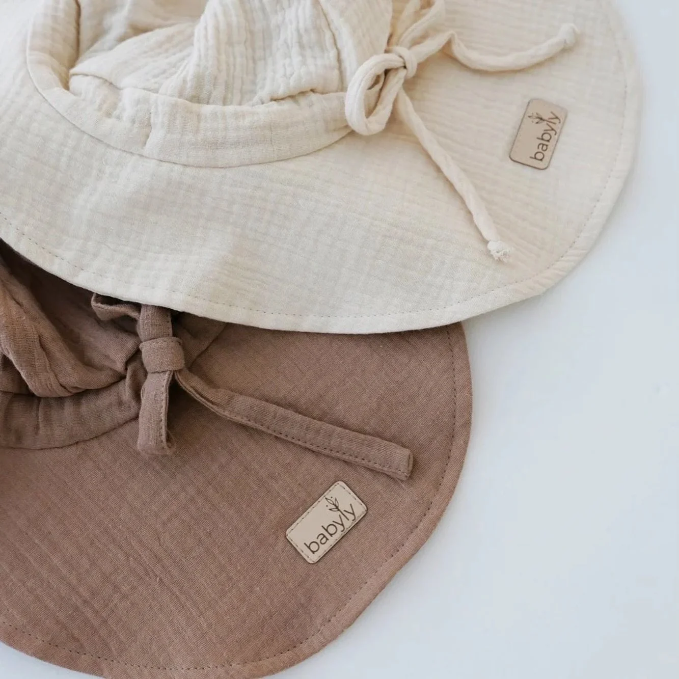 Practical Sunhats in the softest muslin cotton. Adjustable in the back to fit from 6m. #betonstudios