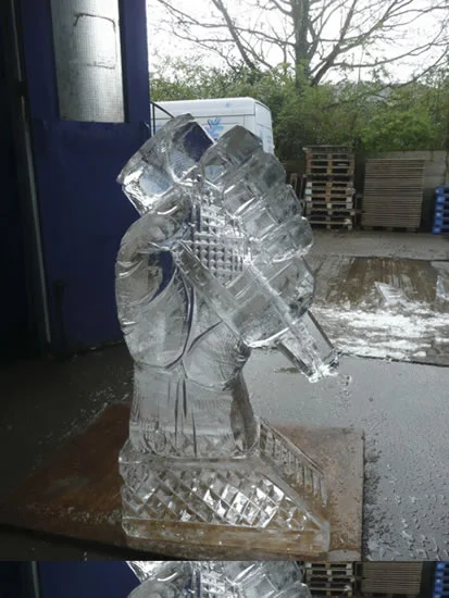 HAND AND BOTTLE ICE VODKA LUGE