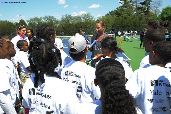Taylor Townsend with kids before the 2013 New Haven Open Tennis Tournament at Yale University in New Haven, Connecticut. Photo by: Bill Weiss/New Haven Open