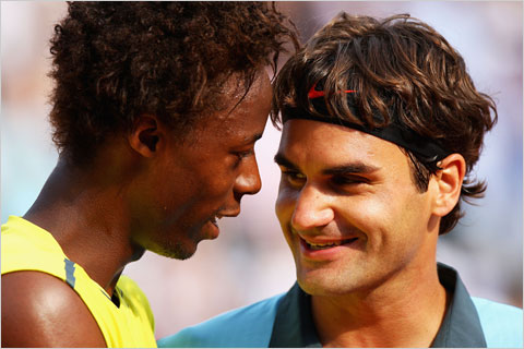 Gael Monfils (left) Roger Federer (right) at 2009 Men's Singles Quarter Final French Open at Roland Garros in Paris, France. Photo by: Ryan Pierse/Getty Images Europe