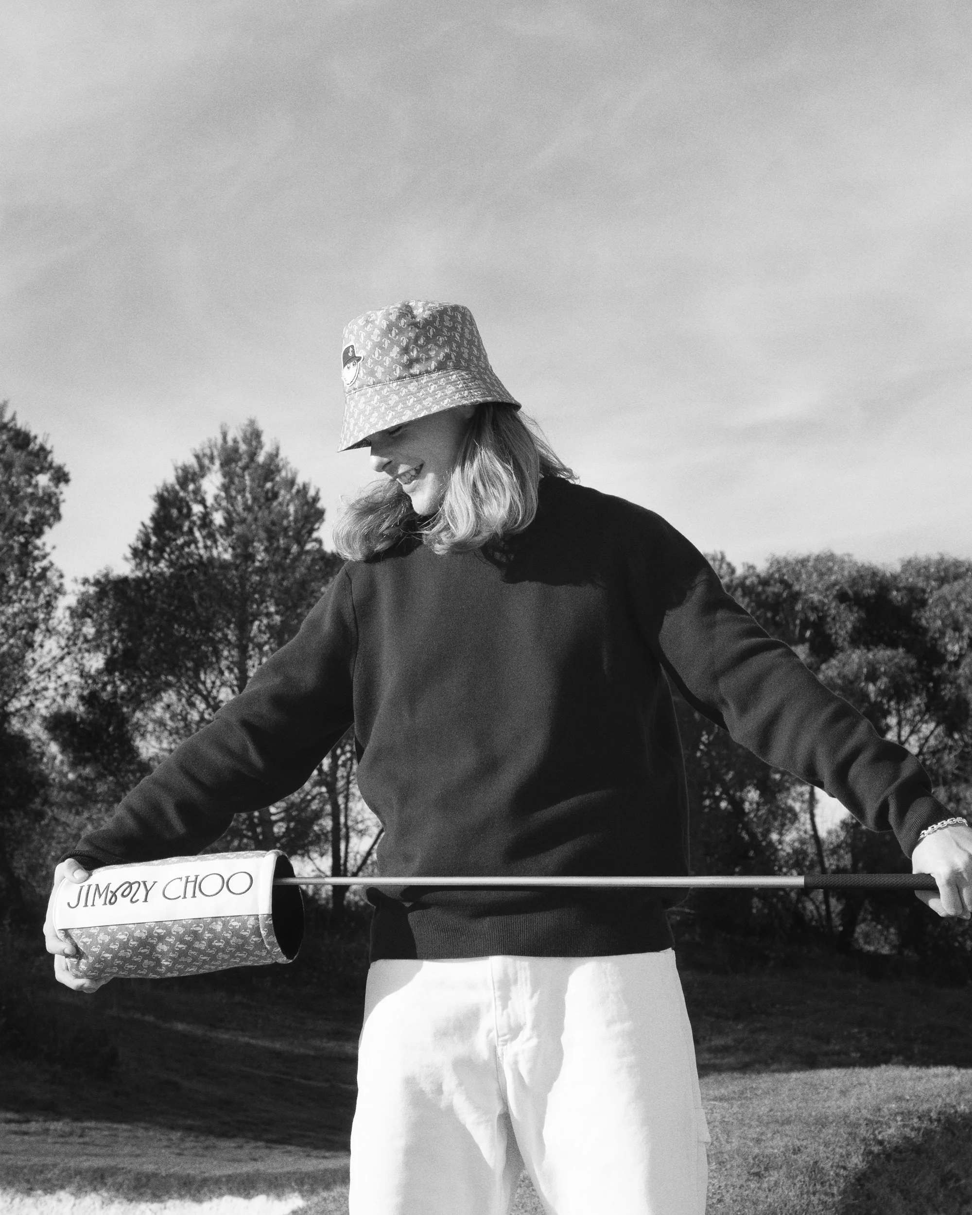 JIMMY CHOO MALBON_MONOGRAM BUCKET HAT & MONOGRAM DRIVER COVER_4X5.jpg