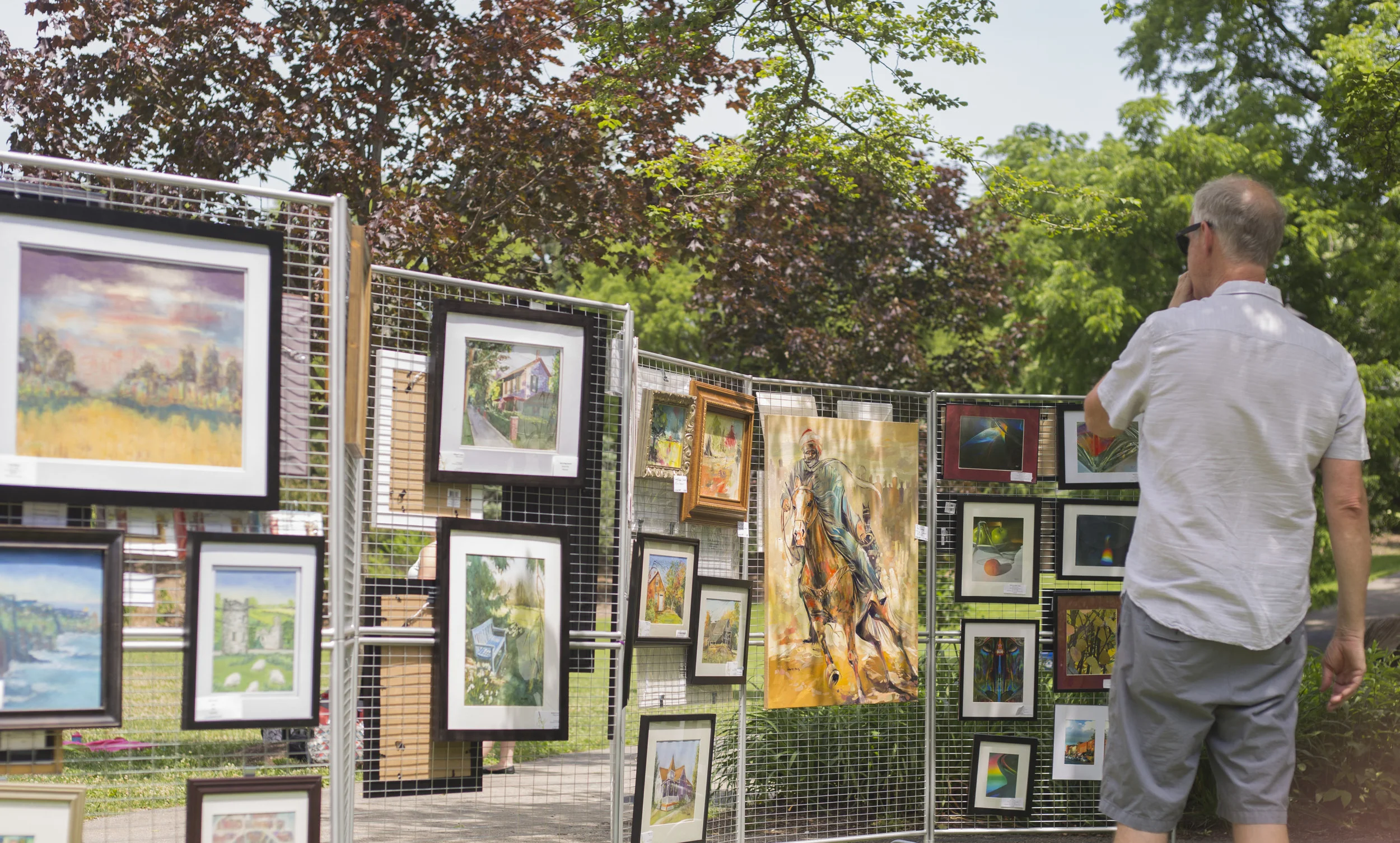 A man observes an art display during the 2016 Westival.