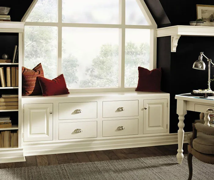 Classic window seats provide storage, seating, and a beautifully framed window.