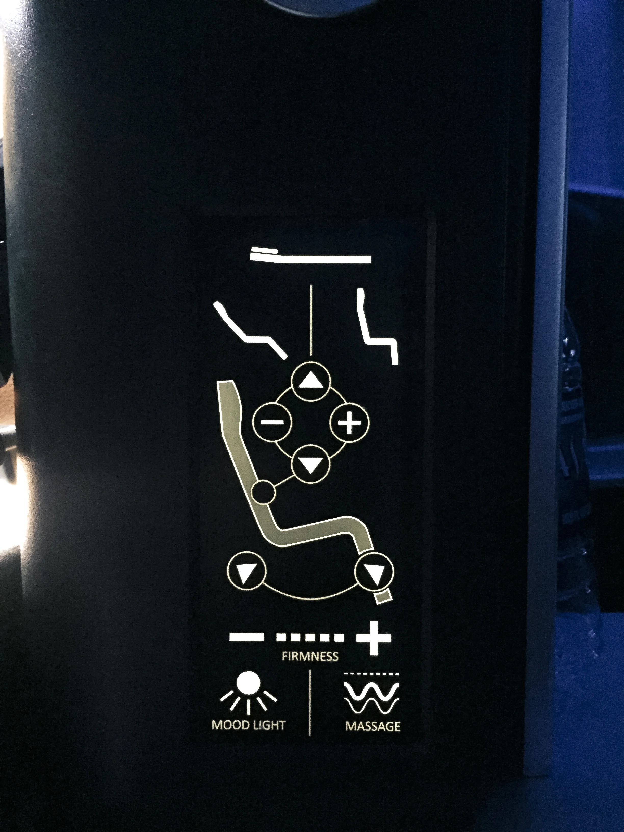 Seat controls, including airbag firmness adjustment.
