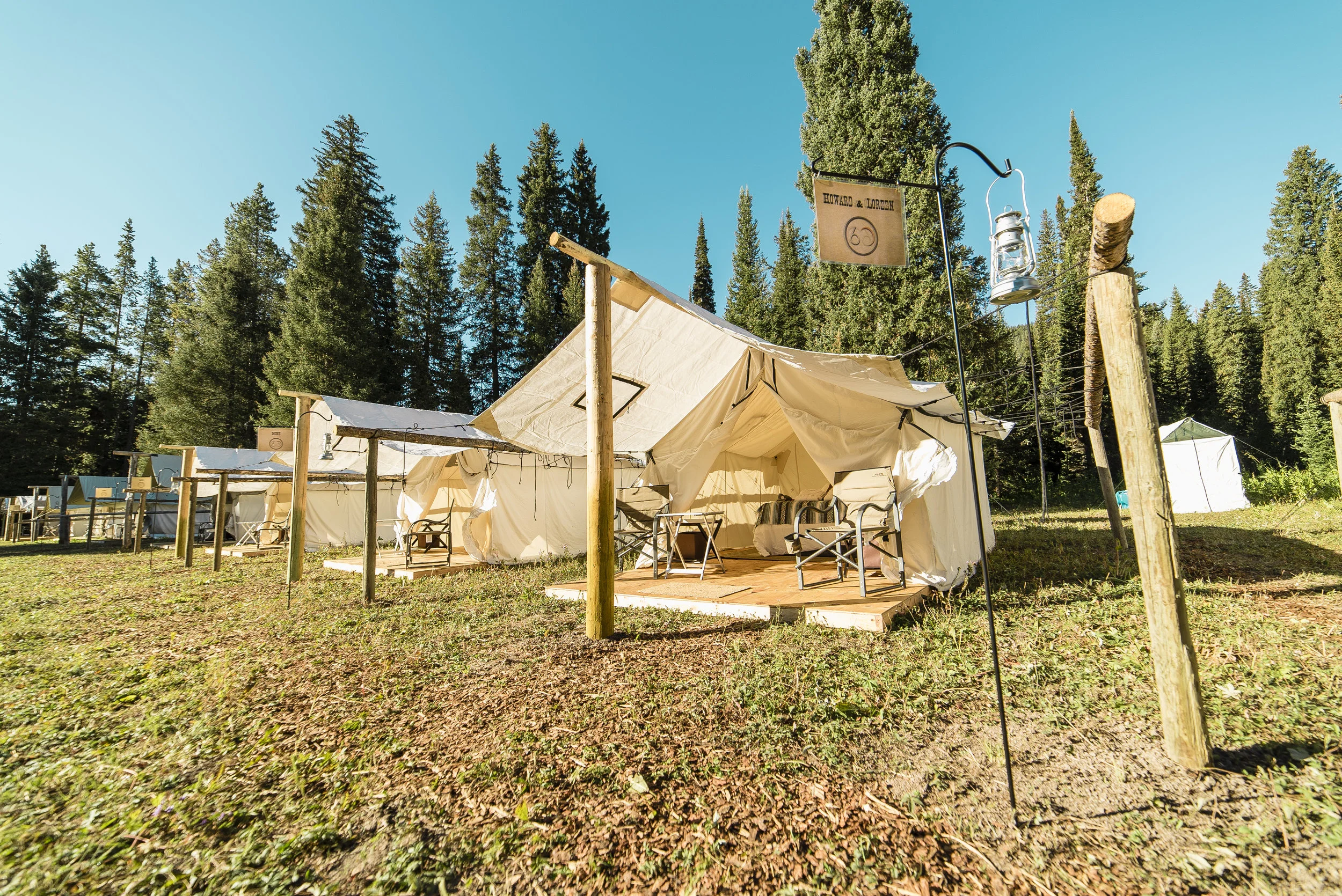 The incredible tents set up for each guest at the camp. Bath houses seen in the background.