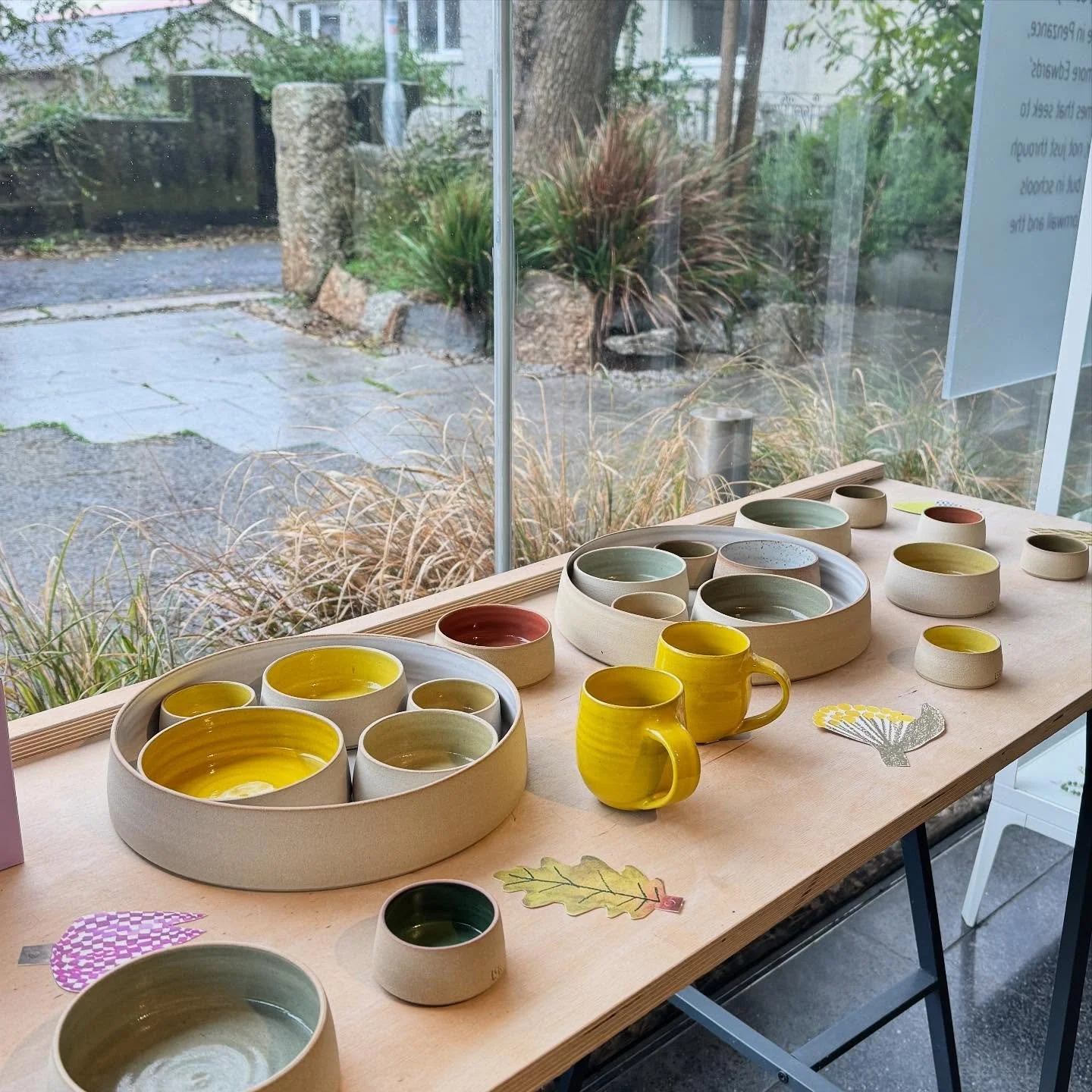 I&rsquo;m thrilled to say that my work will be available in the beautiful shop @newlynexchange over Christmas and it is perfectly displayed; thank you for letting my tondo dishes bask in the sun in the window and I love the wooden cubes hung with fes