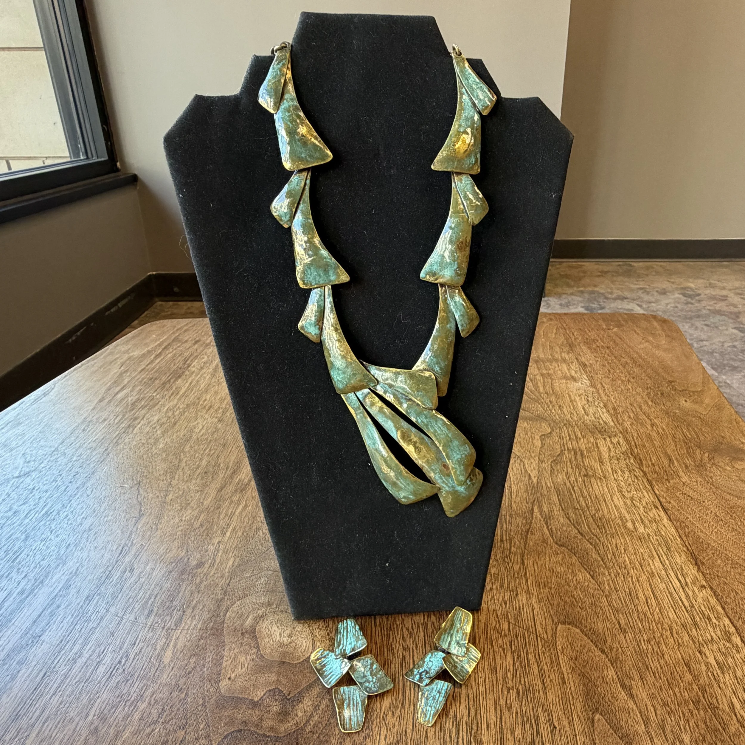 PP26_Donated Tootie Burns_Brass necklace and earrings.jpg