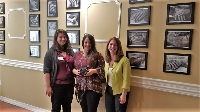 From left, Harbor Program Coordinator Aleks Alekhina, Eva Giannini of Candid Spirit Photography and Executive Director Linda Silveira at Greenwich Farms at Warwick.