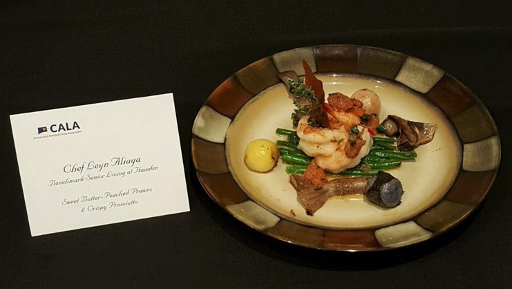 Seafood winner chef Leyn Aliaga with his decadent Sweet Butter-Poached Prawns and Crispy Prosciutto, Bluefoot Mushroom and Marble Potato.