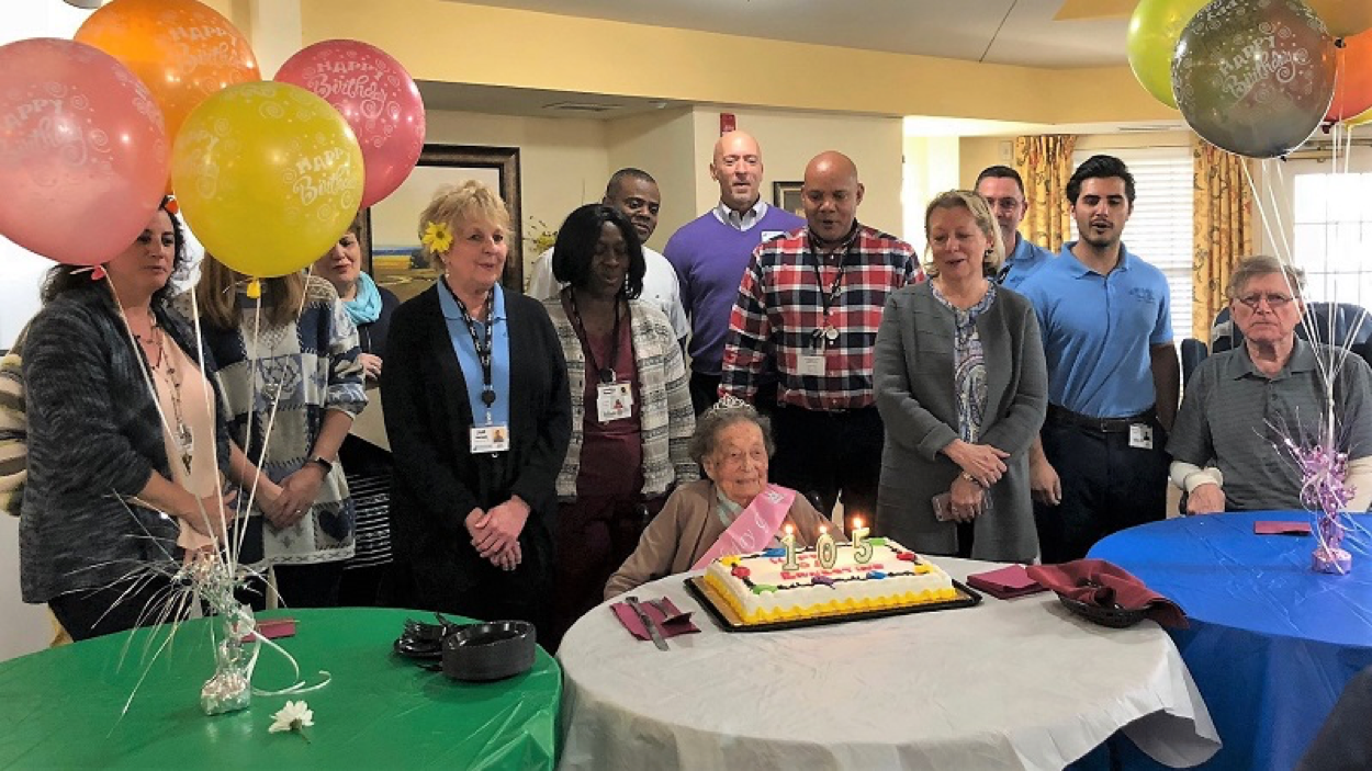 Family, residents and associates celebrate Ernestine Gierman’s 105th birthday.