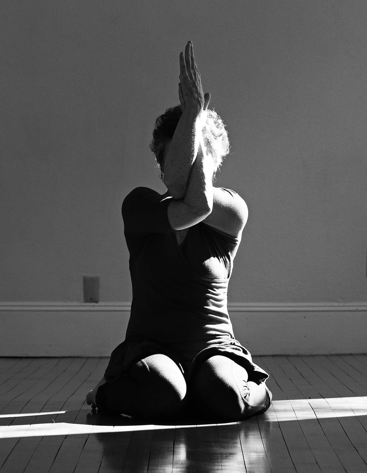 PATTY GOMUK ARMS SEATED.jpg