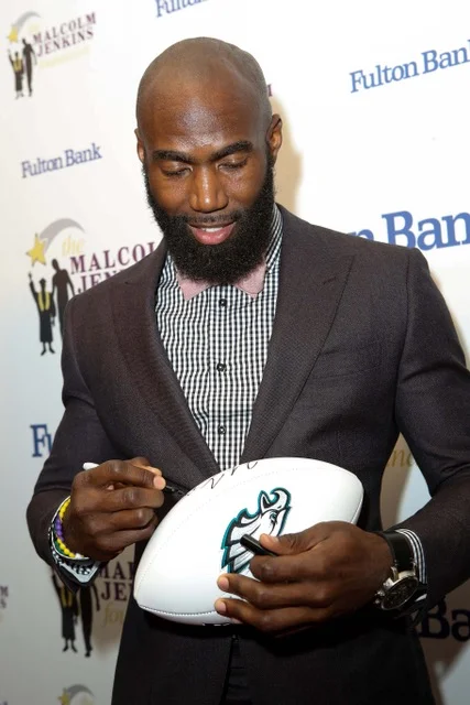 MalcolmJenkinsBallSigning.jpg