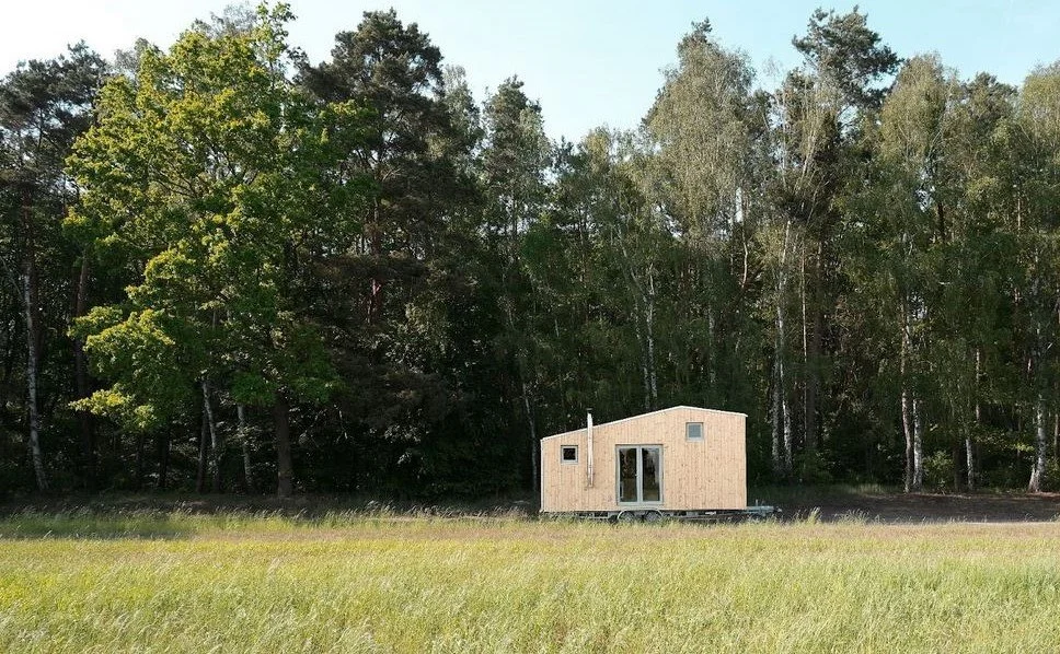  Wooden elevation of REDUKT houses seamlessly blends with surroundings. Photo: REDUKT 