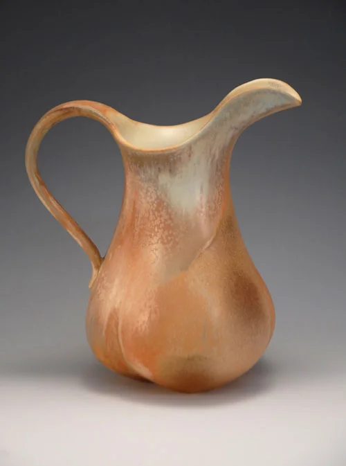 With luck, the next pitcher with these glazes will have a broader sweep of the pastel, crystal-covered drape.
