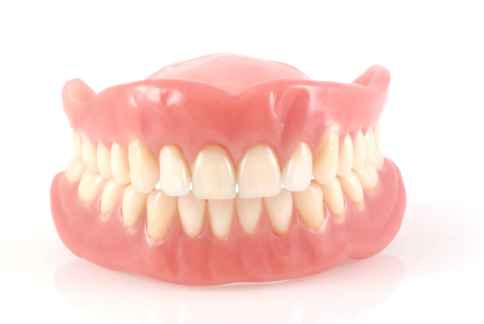 Dentures There are many ways to make dentures and partials. Our process involves trying in the denture or partial each step of the way to make sure you are happy with the fit and the look of the teeth before the denture is sent to the lab for final processing. Adjustment appointments are common following a new denture to adjust any sore spots where the new denture may be rubbing on your tissues.