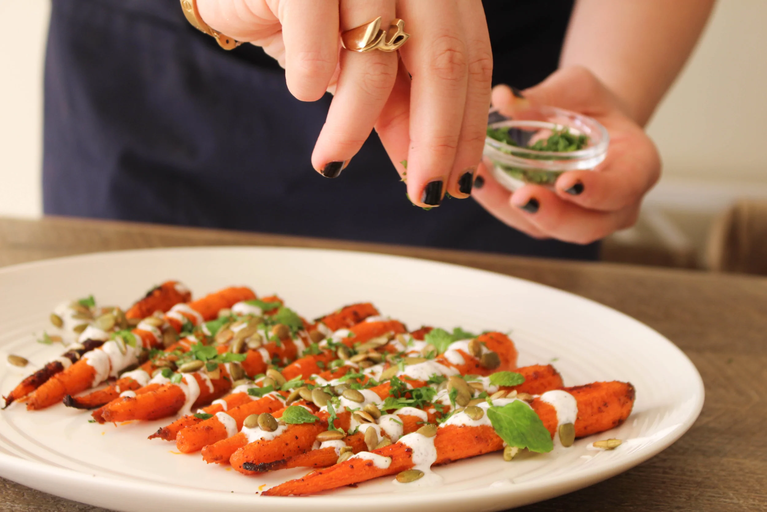 Roasted Cumin Multi-Colored Carrots with Lebne Yogurt and Mint Oil