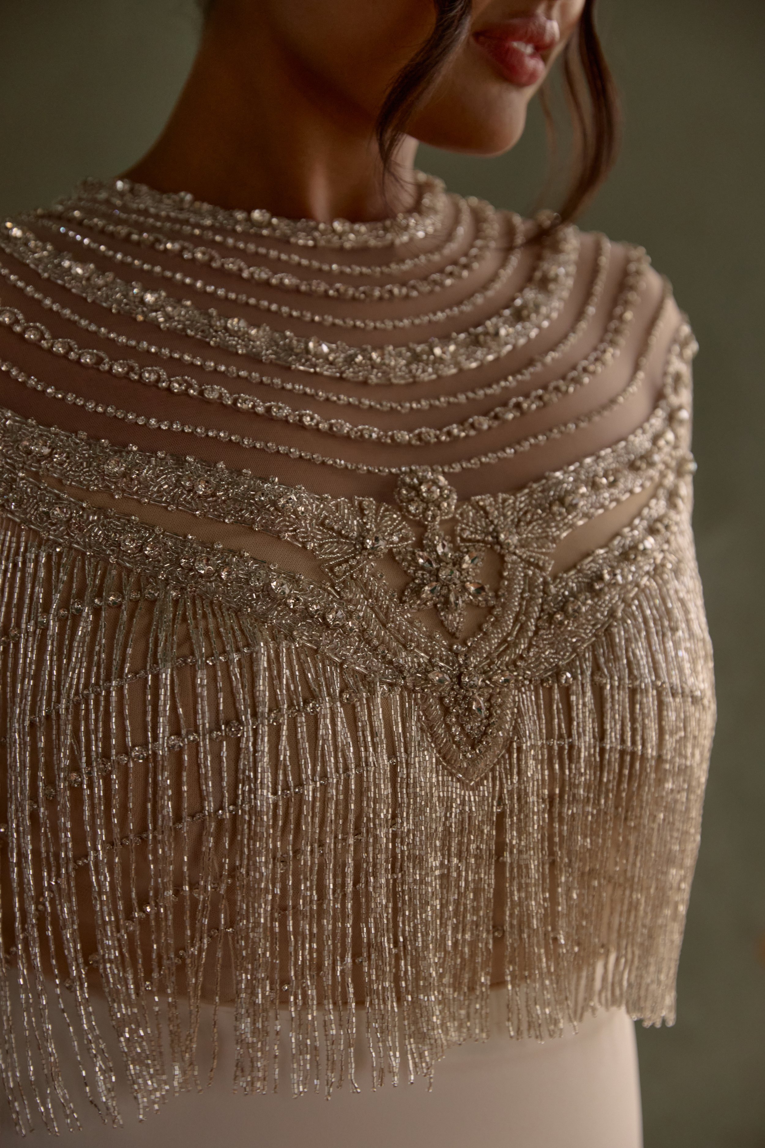 Intricate hand embellished bridal topper.