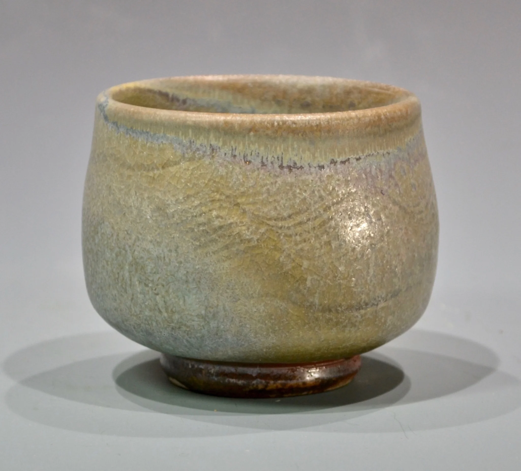 white stoneware cup, 3” x 3”, celadon glazed and anagama fired to cone 10