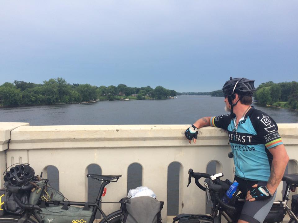 Mike Robertson looking into the water crossing the Mississippi River