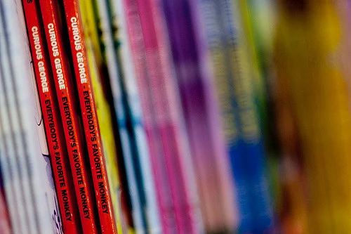 " C urious George Books Bokeh " by Jason Hargrove is licensed using CC BY 2.0