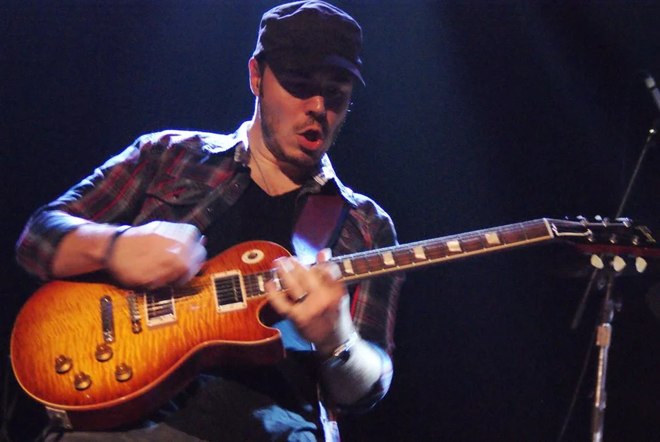 Hines and his "championship belt" Les Paul