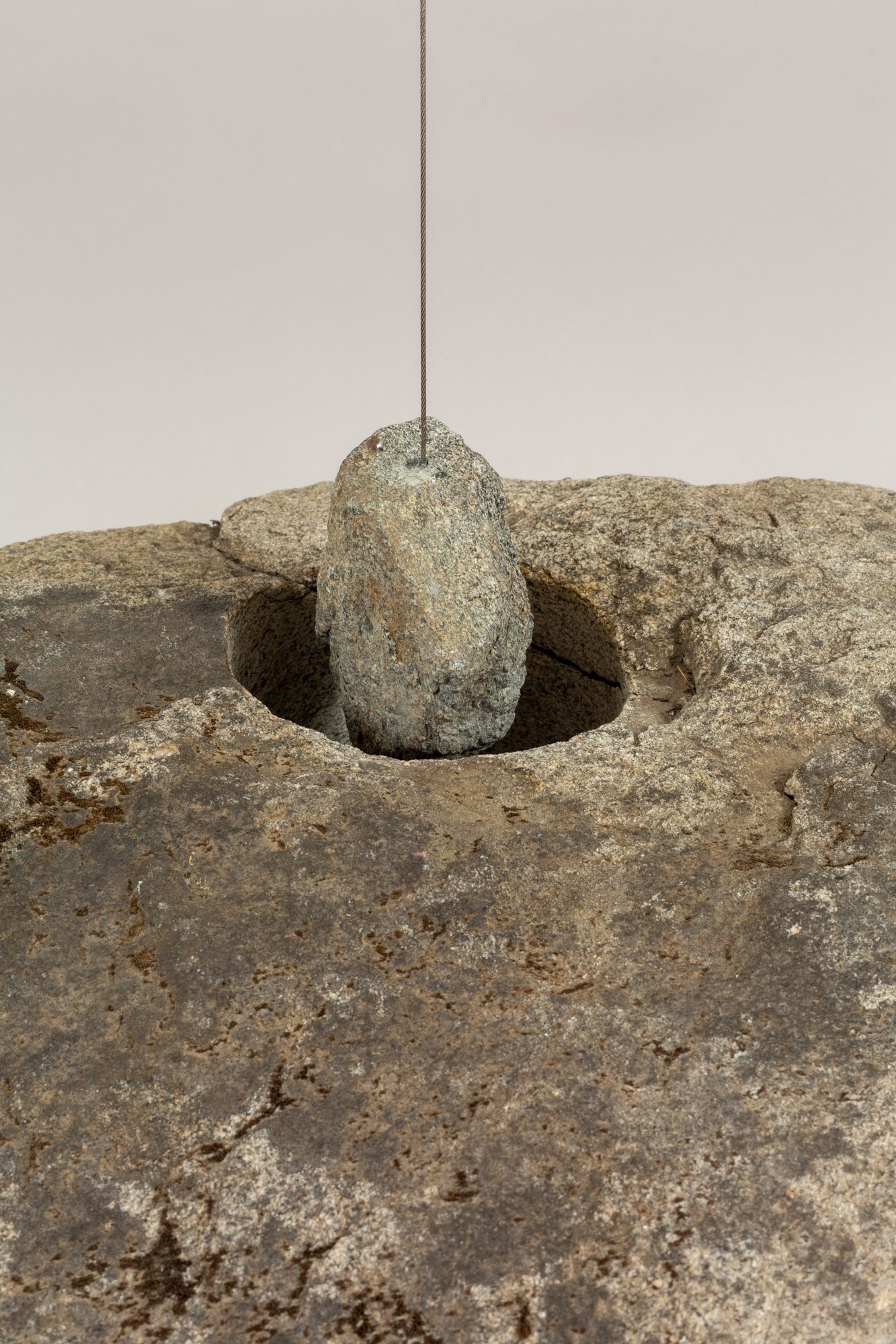 Mark Baugh-Sasaki, Gravity Well, 2021, Steel, cable, motor, granite (Mariposa County), 30 x 24 in
