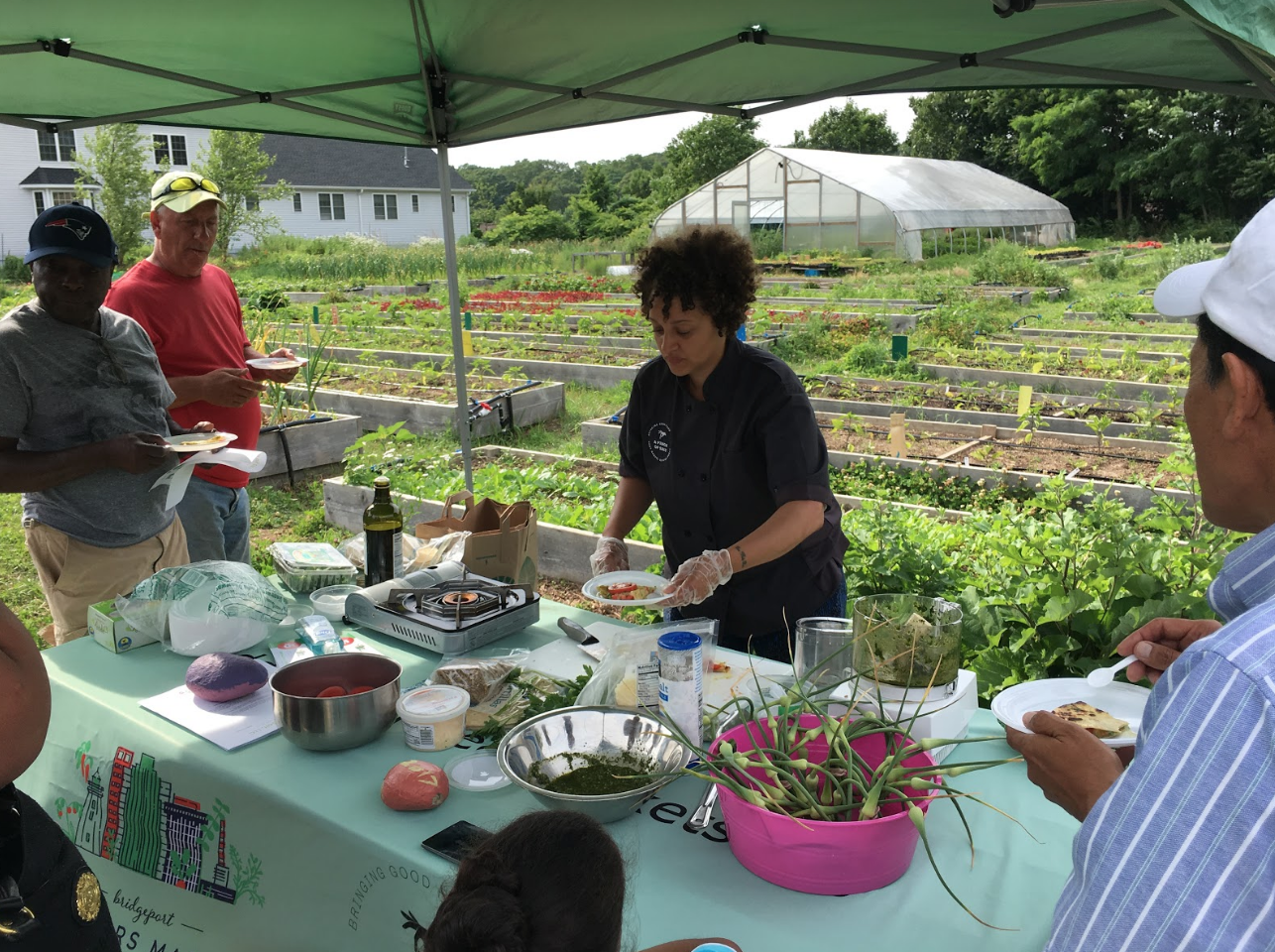 Chef Raquel of A Pinch of Salt doing a cooking demo at one of our Family Farm nights!