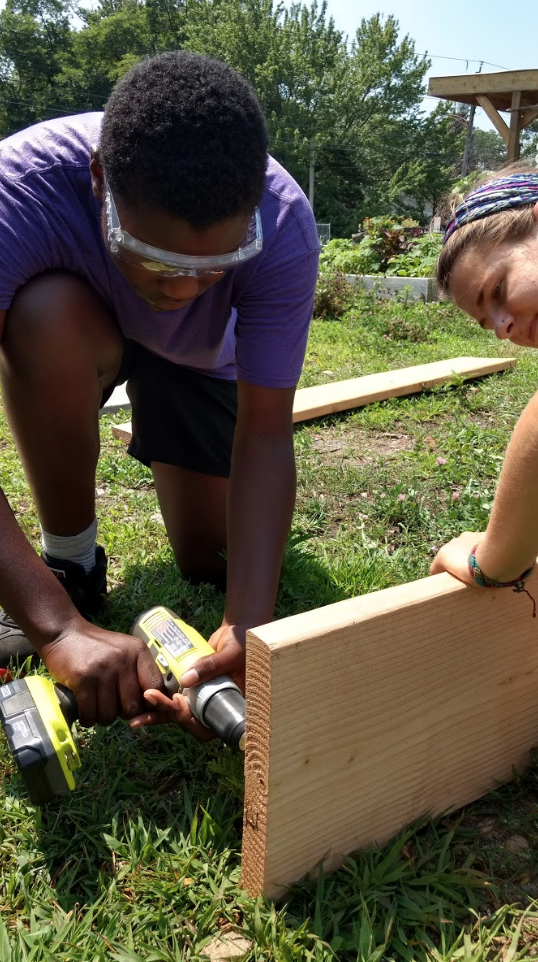 Our 2017 summer Youth Crew building beds at the Reservoir Community Farm with Americorps VISTA Rachel.