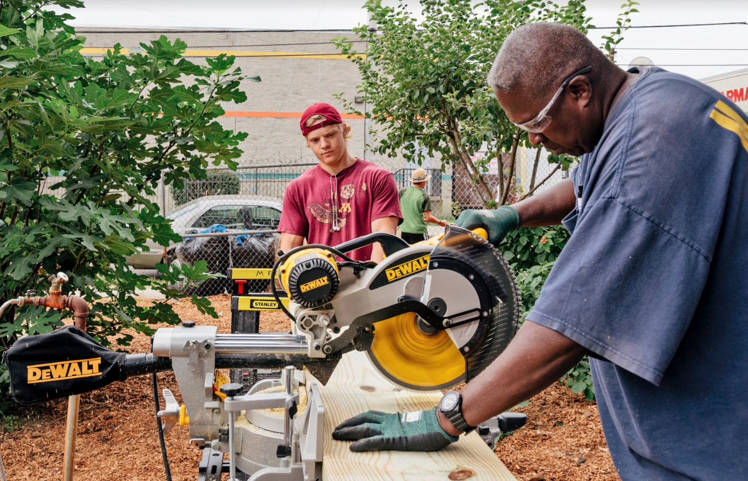 Tom along with Builders Beyond Borders help to build Arctic St. community garden in the spring of 2017!