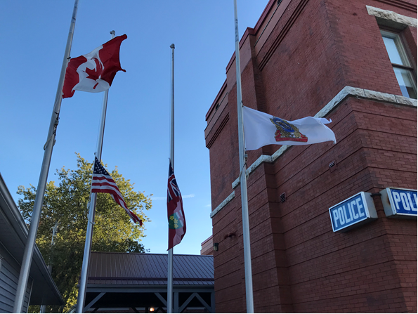 Cobourg Police Flags at Half-Mast.png