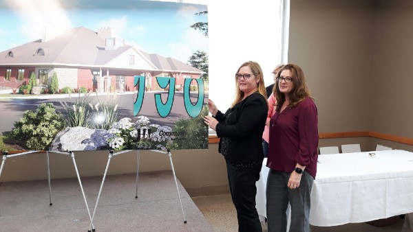  Cathy Foster and Lisa Fowler represented Ganaraska Financial Credit Union - whose employees chose the Ed's House Northumberland Hospice Care Centre to support through their payroll deductions – in helping to unveil the final fundraising campaign tot