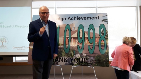  Doug McCann, who had his own experiences with hospice care for a loved one, helped to unveil the final fundraising campaign total for the Ed's House Northumberland Hospice Care Centre at this week's celebration event.   