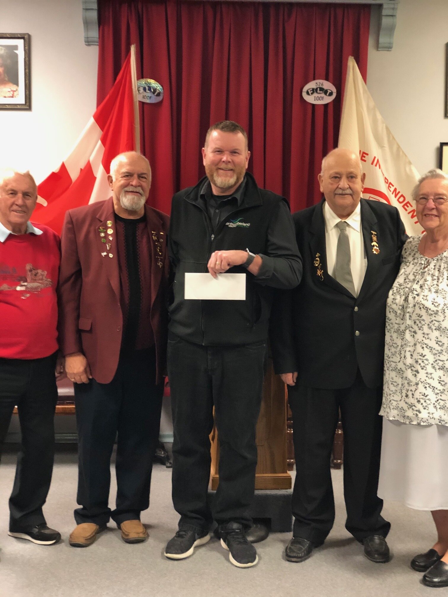  Food 4 All Warehouse manager Rob O'Neill (centre) was delighted to receive a donation from the Durham Memorial Temple Oddfellows Lodge #78 Port Hope and Rebekahs #131 members (from left) Carl Nelson, Dave Bannister, Ed Lake and Glynda Bannister. 