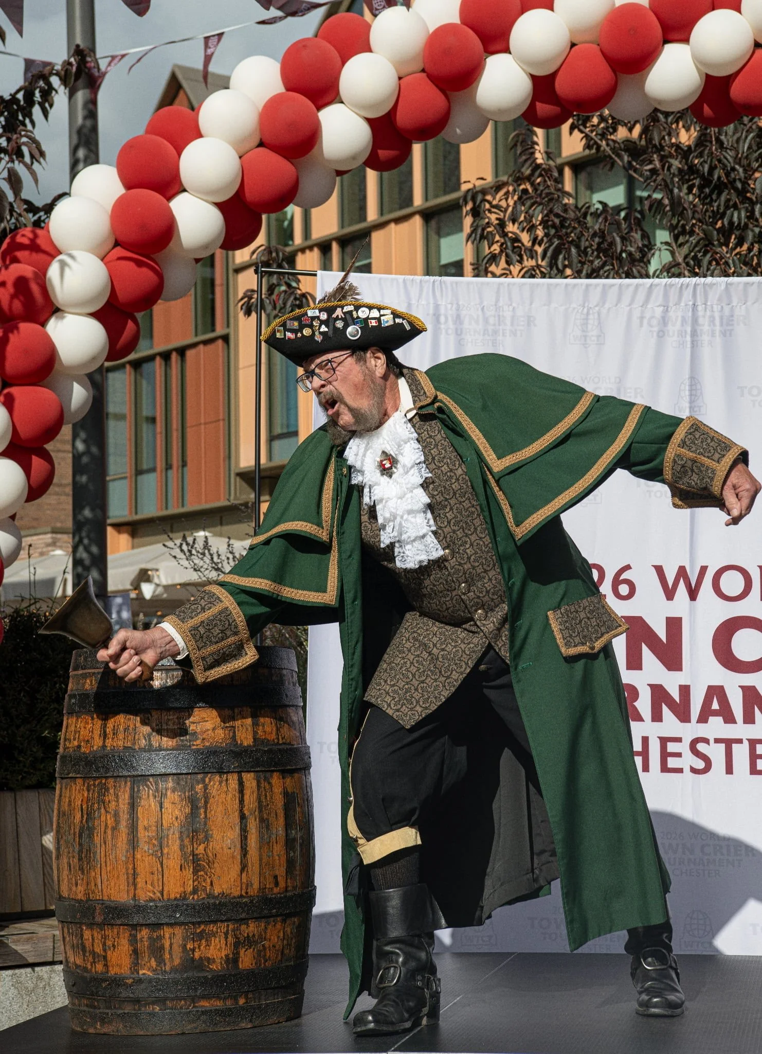 Local town crier describes world event