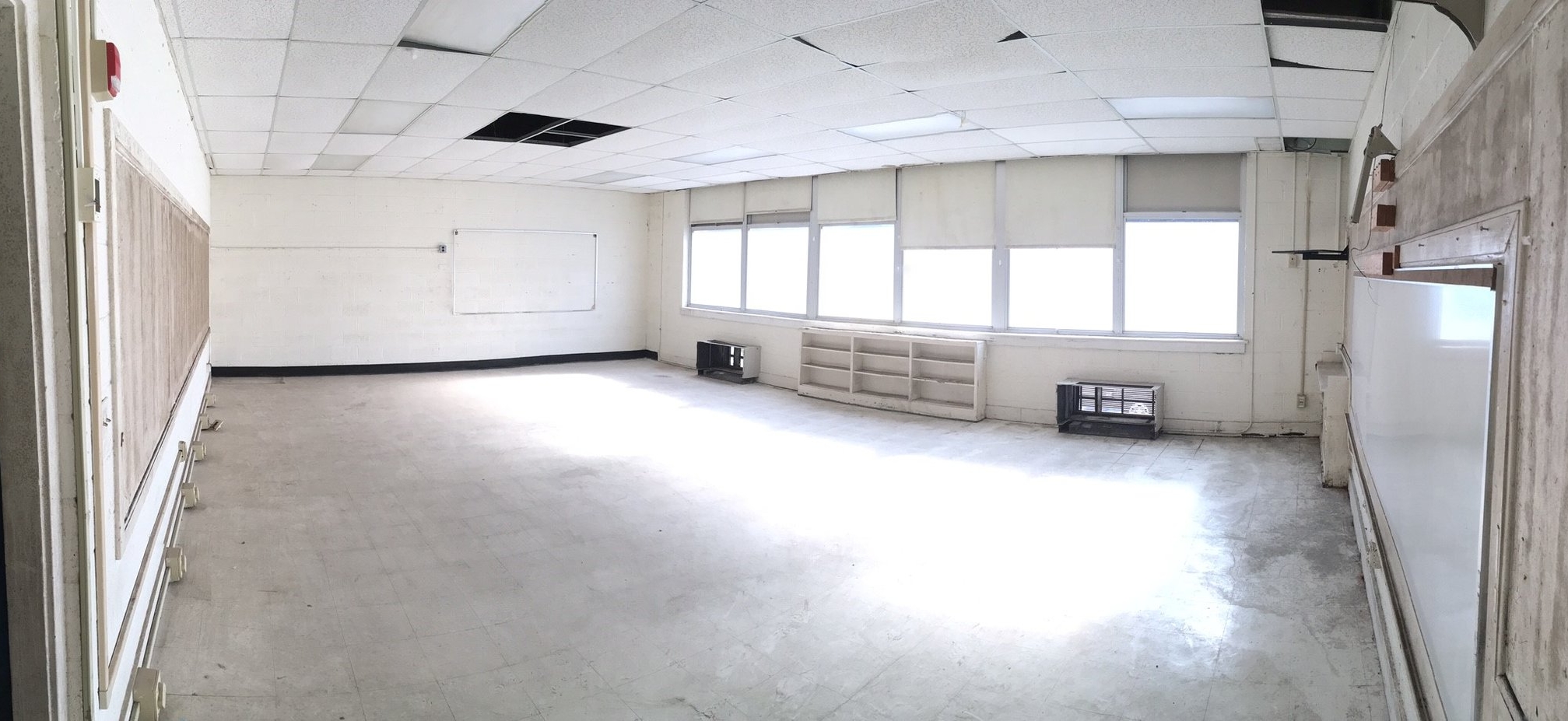 Current condition of Old Chicora classroom. Each classroom will be divided into three to four artist work studios. Natural light and high ceilings allow light to penetrate the space.