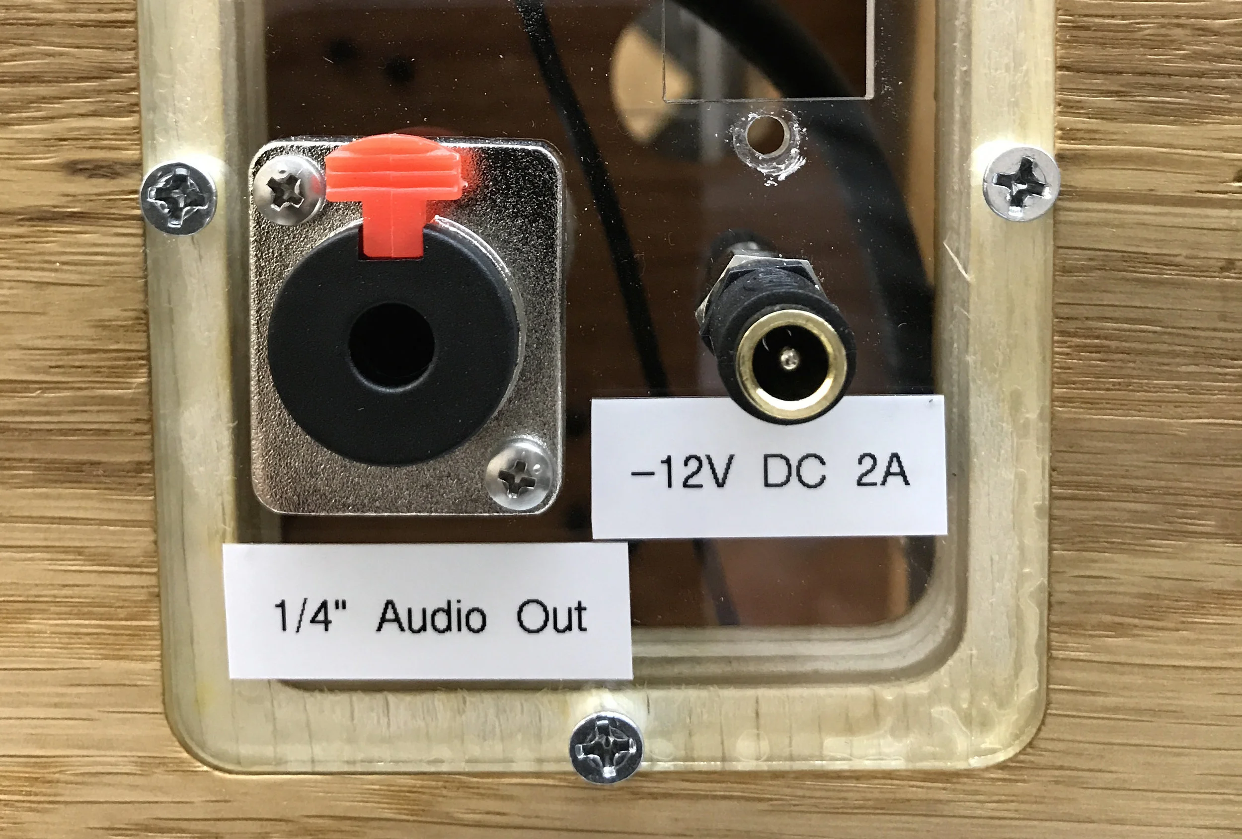 Each sculpture has a 1/4" jack which outputs unbalanced line-level audio. This can connect to speakers.
