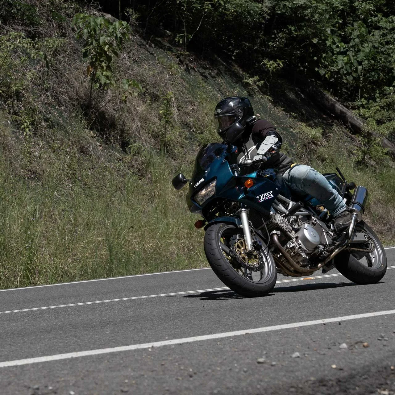 Can you ride a motorcycle with one arm