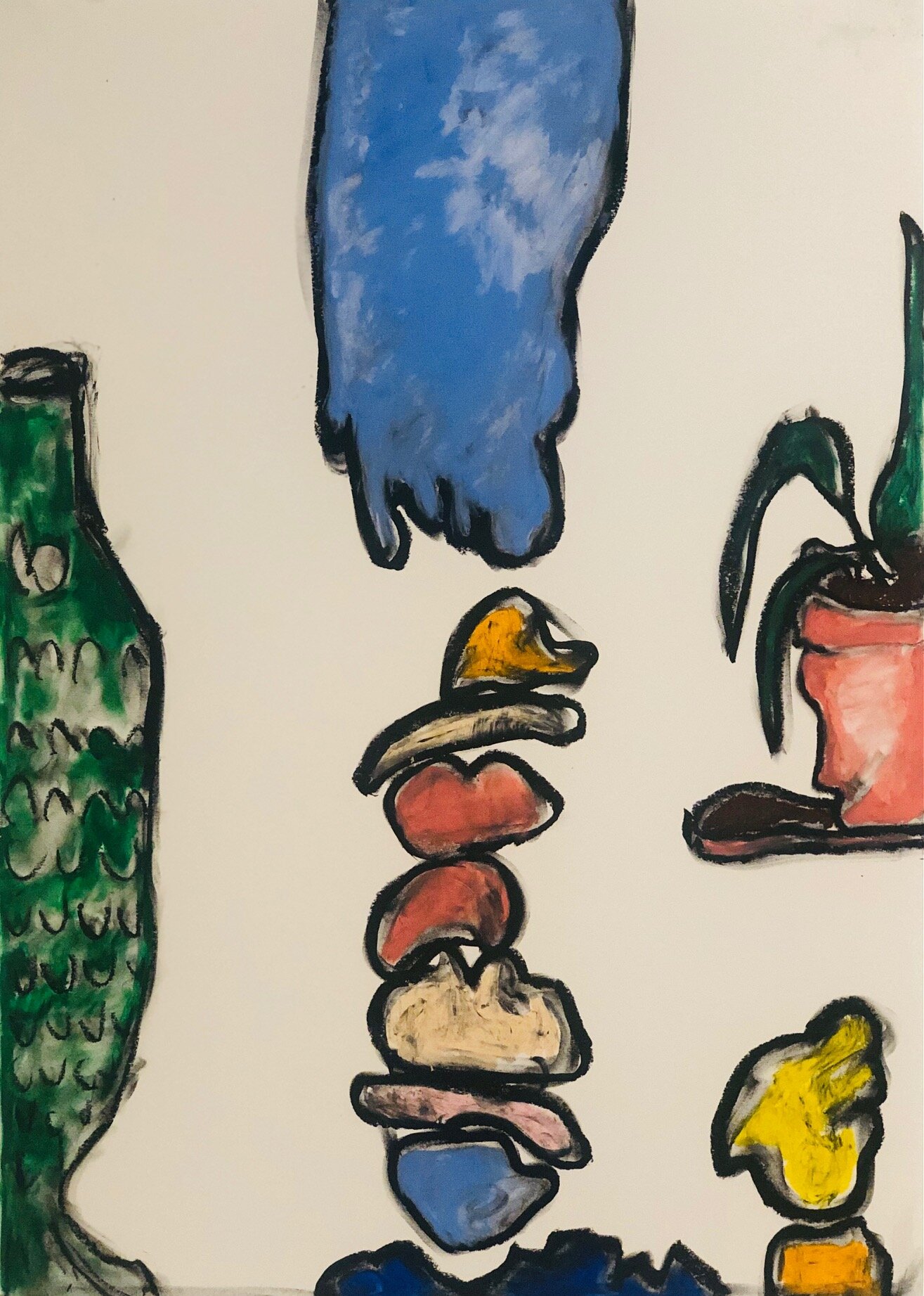 Fish vase and pile of stones