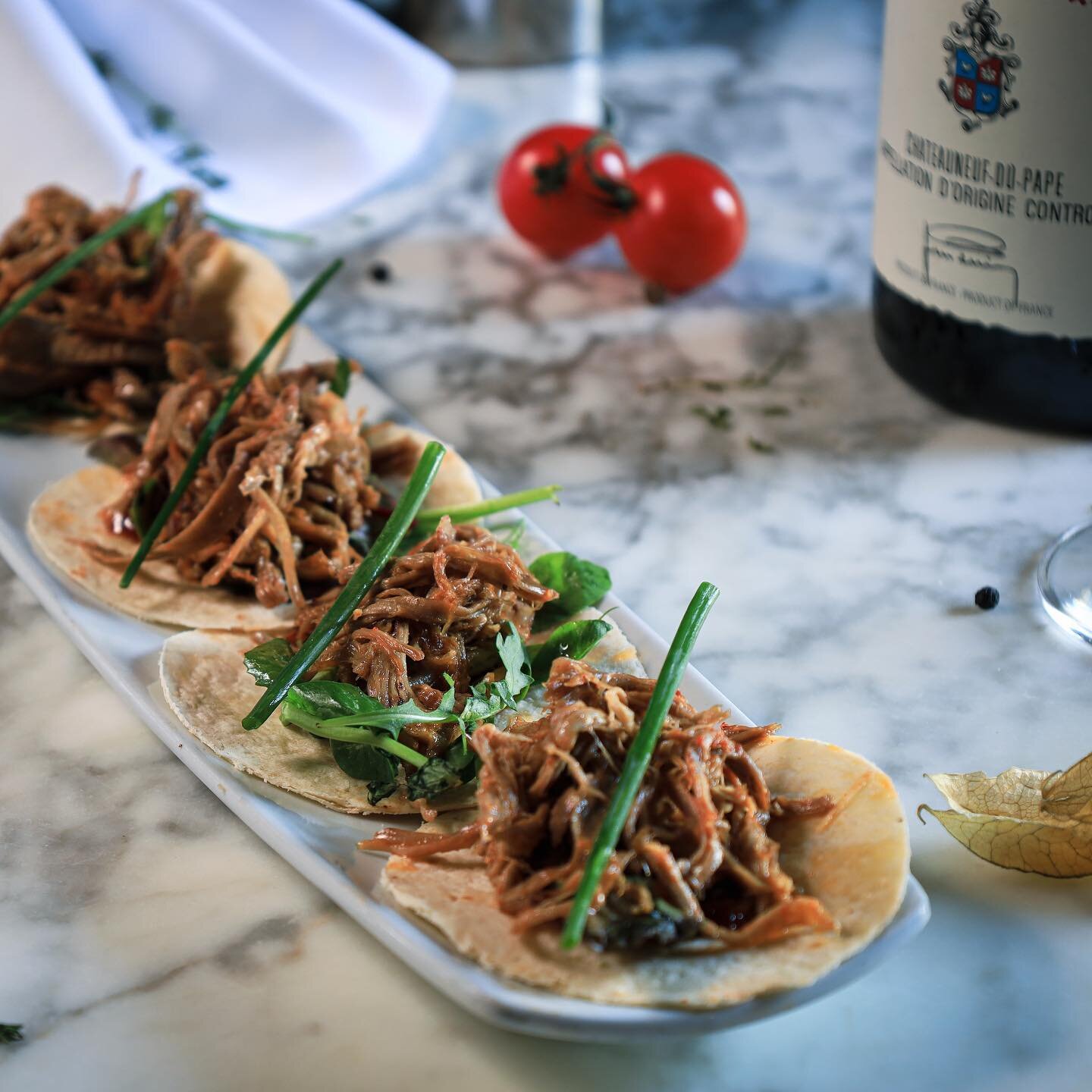 Looking for a delicious starter? Try the best Shredded Lamb Tacos in town 👉🏻 Exceptionally tasty slow cooked shreds of lamb place within four mini tortillas, accompanied with baby gem lettuce and dressed with BBQ sauce. 😋😋

#food #cocktails #taco