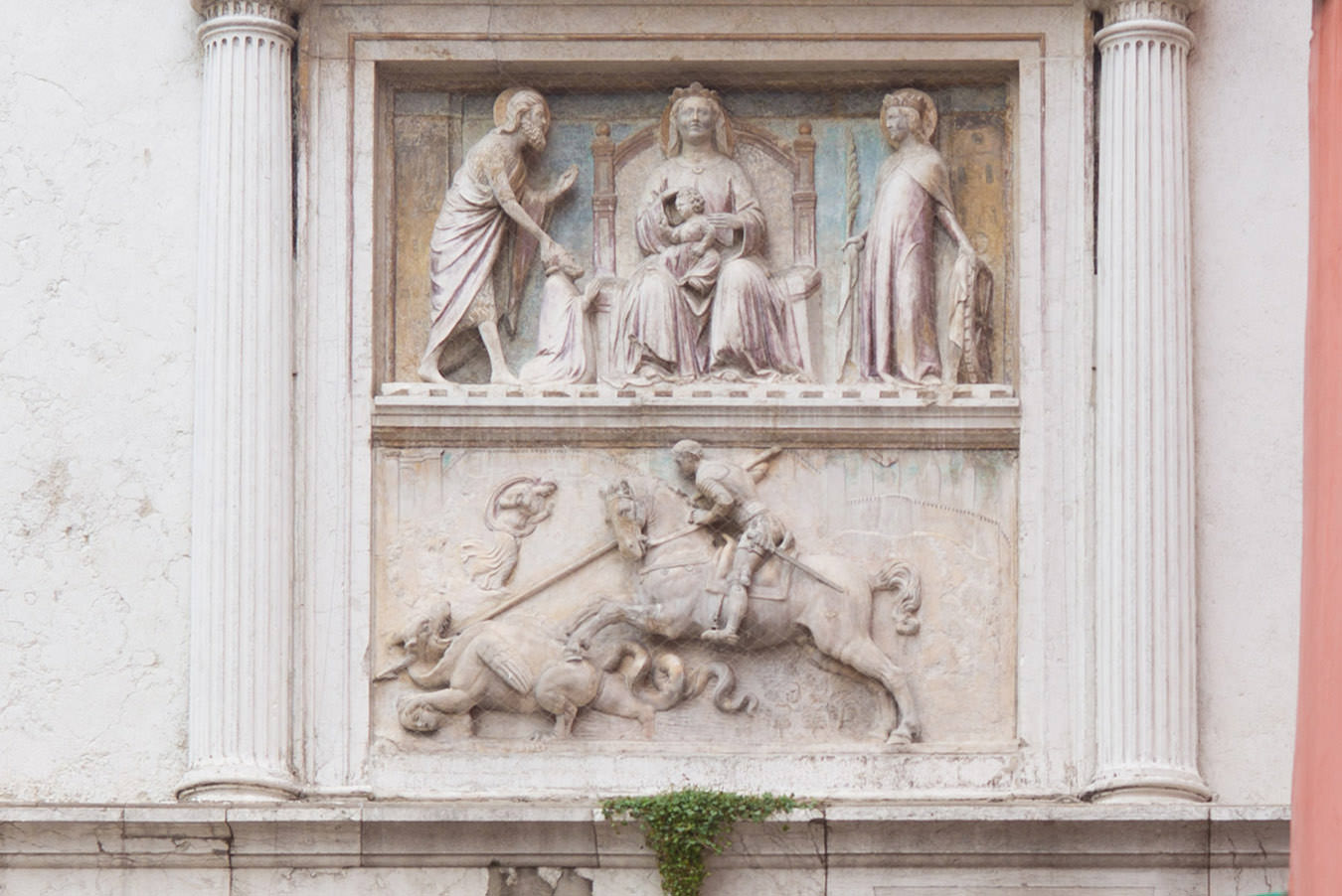 The relief with colors above the main door