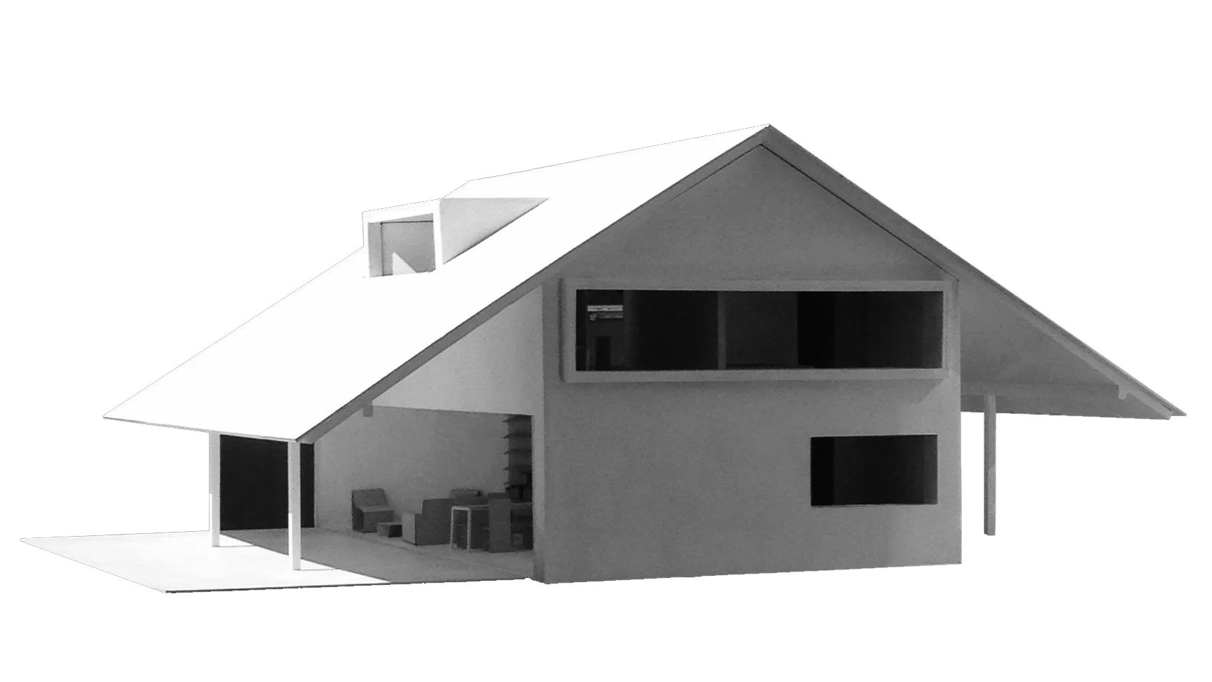 A 3D model of a modern two-story house with a sloped roof, large front windows, a covered porch area with outdoor furniture, and a balcony on the upper floor.