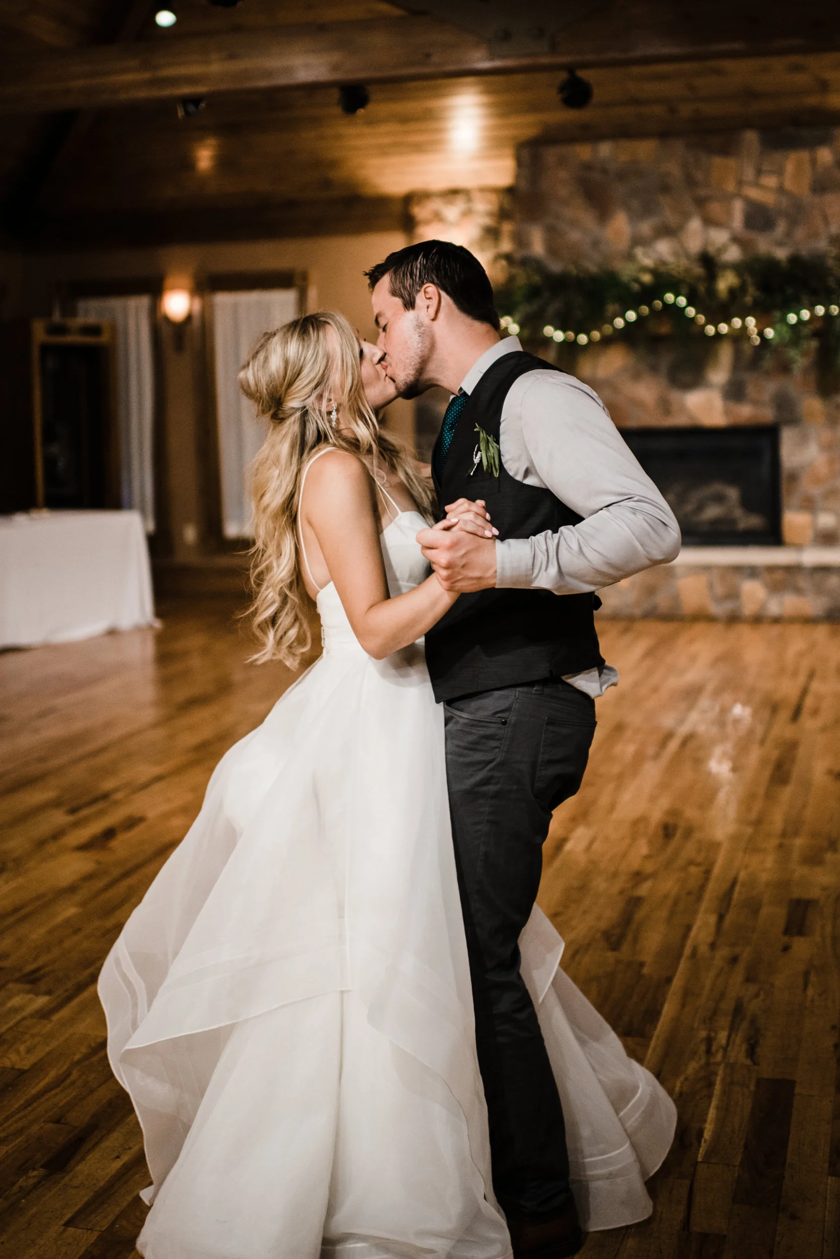 Colorado mountain wedding photographer at Brookeside Gardens wedding reception dances