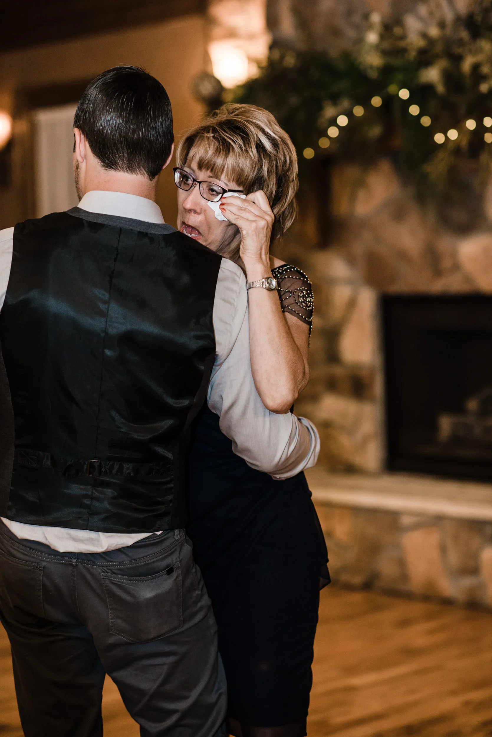 Colorado mountain wedding photographer at Brookeside Gardens wedding reception dances